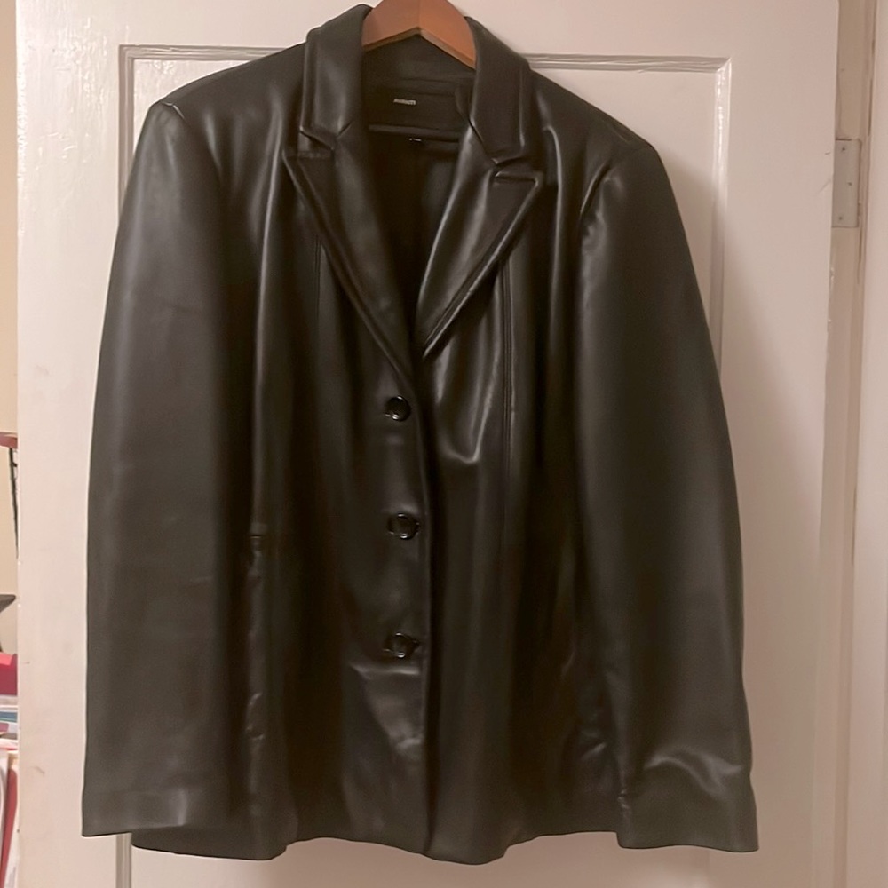 Plush black leather blazer style. Warm in winter. Right pocket lining ripped